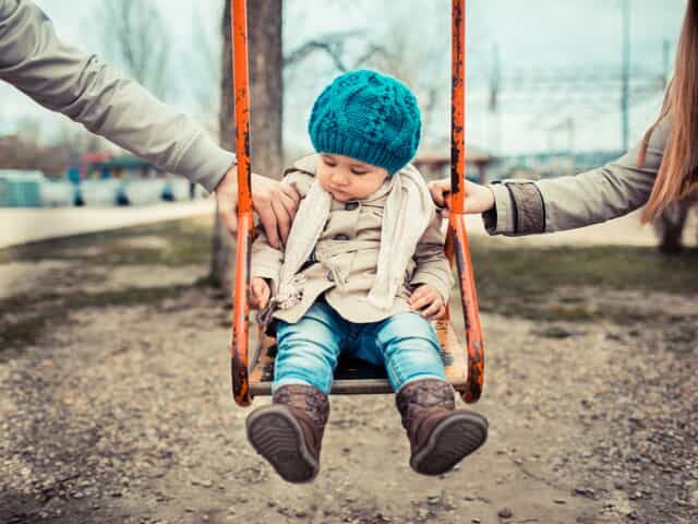 Child custody: Child in swing