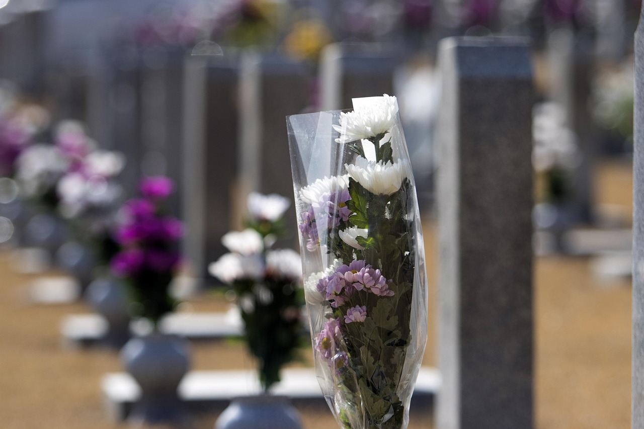 Bouquet of flowers on a tomb at a cemetery
