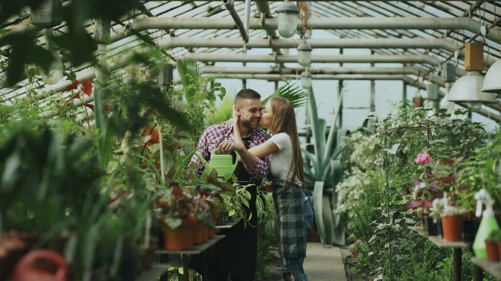 couple in a greenhouse