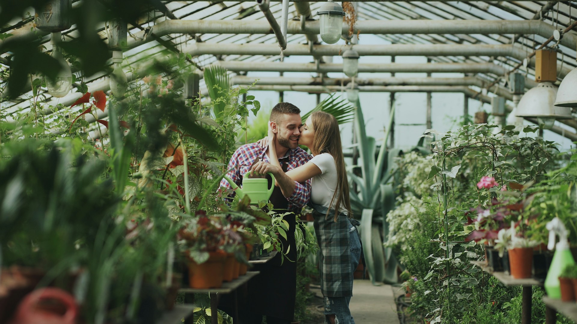 couple in a greenhouse