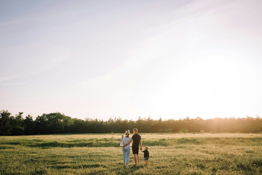 a family in a n open field